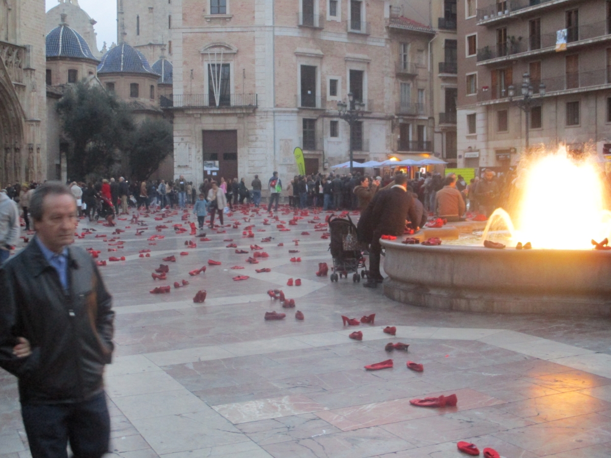 Red Shoes in the Plaza de la Virgen , Valencia, Spain