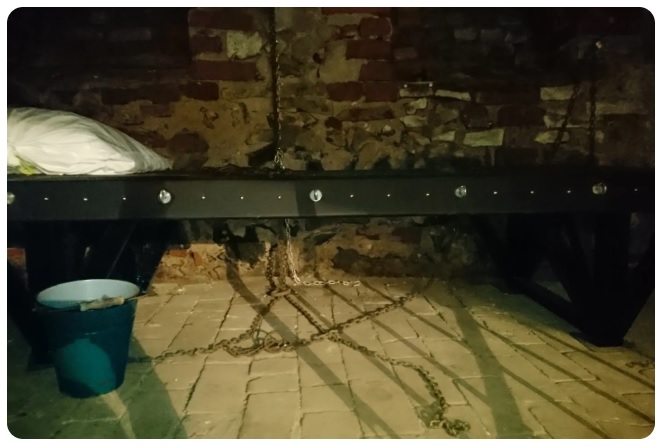 If you want to sleep in a dungeon in Germany, this bed may still be available.