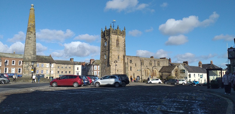 Richmond Market Place with the Town Cross on the Left and the Old Church (now the Green Howards Regimental Museum) in the Center