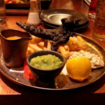 Black Fish and Chips at the Alchemist in Eldon Square, Newcastle-upon-Tyne. The fish isn't burnt. It's meant to look that way.